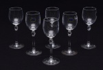 Seis copos de cristal tcheco da Bohemia para licor. Apresentam selo "Bohemia Glass". Altura: 15 cm.