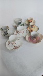 Lote constando de sete conjuntos diversos de xícaras e pires para café. Sendo duas em porcelana francesa Limoges, duas em porcelana japonesa, duas europeias e uma de origem desconhecida.