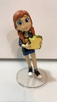 Funko Anna- Boneca com aproximadamente 13 cm. de altura, acompanha base de acrílico.