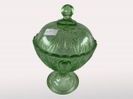 Antiga compoteira em vidro moldado na cor verde com rica decoração em sulcos.  Alt. 20cm. No estado.