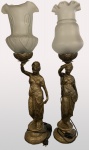 Lote com 2 luminárias em bronze representando damas com tocha. Alt. 85cm com as cúpulas. Funcionando