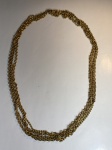 Anos 70 - Cinto cordão feminino em metal dourado. Med. aberto 106cm.