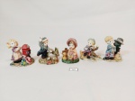 787  -  Lote 5 Esculturas  bibelots representando crianças em resina e porcelana 8 cm altura