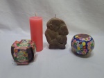 Lote de 4 velas decorativas. Medindo a maior 16cm de altura.