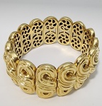 BOUCHERON - Extraordinário bracelete em ouro amarelo, 18 k. Peça reproduzida no catálogo da Casa de