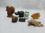 Lote de 7 miniaturas na forma de animais em materiais diversos. Medindo o maior 9cm de altura.