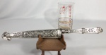 CORNETA -  Antiga faca gaúcha feita em metal banhado a prata ricamente decorado e cinzelado. Possui