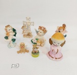 LOTE COM 7 ESCULTURAS EM RESINAS SENDO 6 REPRESENTANDO FIGURA DE ANJOS E 1 CARIMBO COM FIGURA DE URSO.MEDIDAS MENOR 5X2CM MAIOR 9,5CM