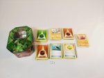 Lote com 168 figurinhas pokemon algumas repetidas na lata .lata com desgastes