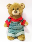 Harold - urso de pelúcia vestindo blusa polo e macacão em jeans stonado. Antigo brinquedo medindo 38 cm.