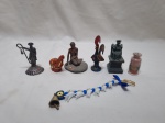 Lote de diversos enfeites, miniaturas, composto de elefante, galo de barcelos, etc. Medindo o maior 9cm de altura.