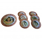 Seis pratos em porcelana Prado decorados com rica policromia representando frutas, Diam. 18 cm.