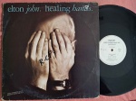 LP ELTON JOHN - HEALING HANDS // CAPA CONFORME FOTOS // DISCO EM MUITO BOM ESTADO // PODE CONTER RISCOS QUE CAUSAM CHIADOS, RUÍDOS OU PULOS