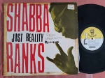 LP SHABBA RANKS - JUST REALITY // CAPA CONFORME FOTOS // DISCO EM MUITO BOM ESTADO // PODE CONTER RISCOS QUE CAUSAM CHIADOS, RUÍDOS OU PULOS