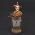 Coleção Half Dolls -  tampa de perfume, cabeça bobo da corte, magnifica expressão. Medida da cabeça 3 cm