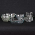 Conjunto contendo 12 bowls de vidro refratário redondo. Maior 31 x 7 x 26 cm / Menor 17 x 7 cm