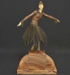 <b>DEMÉTRE H. CHIPARUS</b> - "Starlight Dancer". Escultura criselefantina Art Déco em bronze patinado com rosto e mãos em marfim. Base em mármore rajado. Assinada na base. Dedo mínimo da mão direita faltando imperceptível parte. Med. 59,5 x 34 x 9,5 cm