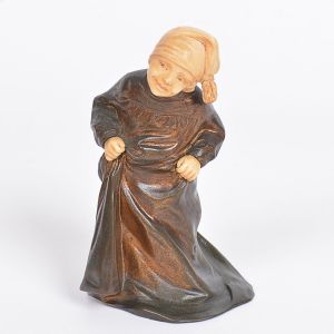 <b>Escultura </b>em bronze patinado com rosto e mãos em marfim representando figura infantil com camisola e gorro. Séc. XIX. Marca A. E no interior e R J X K na base. Pedestal de alabastro, esse com pequena perda. Alt. sem a base 15 cm; Alt. com a base 17 cm