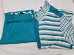 Conjunto de calça e blusa da marca Hêlo Pinheiro, tam: M. Peças com marcas de guardado.