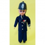 Soldado britânico antigo. Comprimento; 15 cm, Largura: 7cm, Peso: 20gr. O boneco abre e fecha os olhos.