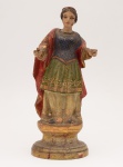 Imagem de Santa Luzia em madeira policromada. Brasil, século XVIII-XIX. Altura: 27 cm.