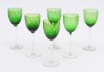 Conjunto de 6 taças em cristal Tcheco na cor verde. Medida: 20 cm.