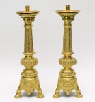 Par de tocheiros italianos em bronze e metal amarelo. Início do século XX. Altura: 54 cm.