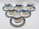 Jogo de 6 xícaras de café em porcelana Steatita barra azul com ouro. Medindo 6cm x 5cm de altura.