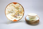 PORCELANA ORIENTAL - Belo conjunto de chá em fina porcelana japonesa, dita CASCA DE OVO, ricamente pintado a mão com pássaros e delicadas flores policromadas, composta de: 4 pires e xícara de chá.