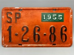 COLECONISMO - Placa automotiva em alumínio - Laranja - SP 1-26-86 - Plaqueta menor 1955. Med. 20,5x35 cm.