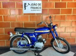 MOTOCICLETA- YAMAHA YB 50 1975- Moto em muito bom estado, restaurada recentemente, com pintura e cromados em perfeito estado. Farol original CIBIE. Difícil de se ver a venda nessas condições, grande oportunidade. Funcionando, porém sem documento, servindo apenas para uso recreativo, decoração ou exposição. <br><br>DESPESA ADICIONAL DE PÁTIO E LOGISTICA R$290,00. <br><br>As obras serão vendidas "NO ESTADO" em que foram recebidas e expostas. Em se tratando de automóveis, estes são leiloados no estado que se encontram no momento do pregão, não havendo garantia de funcionamento de motor e/ou elétrica, razão pela qual no período de visitação é garantida a visita por expert da confiança do arrematante.  A descrição de estado ou vícios decorrentes do uso são pontuadas na descrição dos objetos/veículos/obras, porém não vinculam e nem constituem garantia de funcionamento. </br><br>