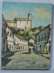 ASSINATURA NÃO IDENTIFICADA - "Rua São José - Ouro Preto" óleo sobre eucatex, assinado e datado 1975, com dedicatória no fundo. Med. 39 x 30cm.