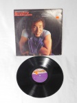 LP/VINIL -  Smokey Robinson "One Heartbeat", ano de 1987. Mídia não testada e capa com desgastes.