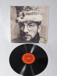 LP/VINIL - Elvis Costello "King of America", ano de 1986. Mídia não testada e capa com desgastes.