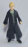 Harry Potter - Rara e Original escultura do personagem Draco Malfoy - Warner Bros - Articulado - Em plástico rígido e borracha rígida. A sua capa sai - Conforme fotos - OBS: Possui pequena perda na pontinha do nariz, conforme fotos - Medida: 13 cm de altura.