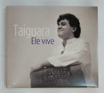 Lindo e conservado CD Álbum - TAIGUARA - ELE VIVE - ANO: 2014 - KUARUP - Possui encarte  com as letras das músicas. Medida: 14 cm x 12,5 cm.