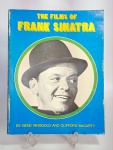 Lindo livro - THE FILMS OF FRANK SINATRA - By Gene Ringgold and Clifford McCarty - Ano: 1973 - Citadel Press - Idioma: Inglês - 249 páginas conservadas com riqueza de ilustrações e textos sobre os filmes de Frank Sinatra. Medida: 28 cm x 22 cm x 2 cm. Possui dedicatória. ACERVO do violinista, cantor e compositor Jararaca (José Luiz Calazans) e de seu filho Luiz Calazans.