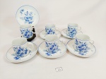 6 Xicaras café em porcelana Polovi decorada flores azuis 5 x 5 e pires 11 cm