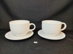 2 xicaras de consume com prato em porcelana branca sendo oxford e germer prato 19 cm  e xicara 9,5 cm x 13 cm