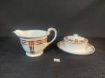 Mantegueira e Leiteira em Porcelana Noritake  JAPONESA  decorada listras laranja e preto com friso ouro . mede mantegueira 3 cm x 8 cm e leiteira 7 cm x 10 cm