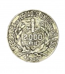 BRASIL REPÚBLICA VELHA - Antiga moeda de prata de 2000 Réis, datada 1929. Mede 2,5cm.