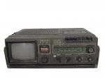 BROKSONIC, TV rádio cassete modelo CIRT-1818, possuindo quebra em 2 partes, vendida no estado, medindo 16x41x36cm, sinais de oxidações.