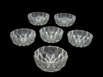 CRISTAL, seis bowls para sobremesa confeccionados em cristal facetado ricamente lapidado em estrelados, bordas levemente denteadas. Medidas 5 x 11,5 cm