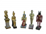 Cinco (5) ESCULTURAS em resina confeccionadas em resina representando respectivamente Osíris, Isis, Neith, Ptah e Anúbis. Altura da maior 11,5 cm e da menor 10 cm