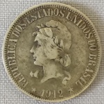 NUMISMÁTICA, Brasil, República, uma (1) moeda em PRATA (teor 900 milésimos) de 1000 reis 1912, peso aproximado X (10 gr.), muito bom estado de conservação. (AJBJ)