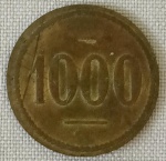 NUMISMÁTICA, uma (1) antiga ficha, confeccionada em bronze, valor 1000, verso com as letras BHE, medindo 25 mm diâmetro, sinais de uso, vide foto. (AJBJ)