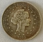 NUMISMÁTICA, Brasil, República, uma (1) moeda em PRATA (teor 900 milésimos) de 1000 reis 1913, peso aproximado 10 gr., anel com estrelas soltas, muito bom estado de conservação. (AJBJ)