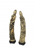 ESCULTURAS, Duas esculturas confeccionadas em resina representando casal de divindades chinesas, medindo 66cm de altura.