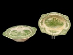 JOHNSON BROTHERS (Staffordshire, Reino Unido, 1883  China, 2015), OLD BRITAIN CASTLES. Terrina e travessa funda confeccionadas em faiança inglesa esmaltada na tonalidade branca, centro da terrina retratando Castelo de Windsor ( é uma residência real localizada na cidade de Windsor em Berkshire, Inglaterra, Reino Unido. A edificação é notável por sua longa associação com as famílias reais inglesa e britânica e também por sua arquitetura) e da travessa retratando Castelo de Raglan (é um castelo medieval localizado ao norte da vila de Raglan, no município de Monmouthshire, no sudeste do País de Gales) e borda com elementos florais e vegetalistas na tonalidade verde, travessa apresentando marcas do tempo e tampa da terrina com bicado, travessa medindo 6x23x18cm e terrina 10x25x23cm.