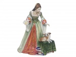 ROYAL DOULTON (Inglaterra, 1815), designed by P. Parsons. "Lady Jane Grey". Escultura confeccionada em porcelana esmaltada na tonalidade branca representando Lady Jane, (nascida em outubro de 1537, Bradgate, Leicestershire , Inglaterra  falecida em 12 de fevereiro de 1554, Londres) foi a rainha titular da Inglaterra por nove dias em 1553. Vestes esmaltadas em policromia com realces em ouro, peça de edição limitada tendo 5000 exemplares, nº 468, medindo 21cm de altura, em excelente estado de conservação.